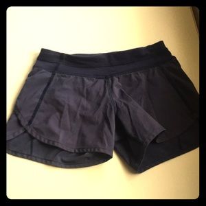 Blue ivivva shorts with a fully functional zipper